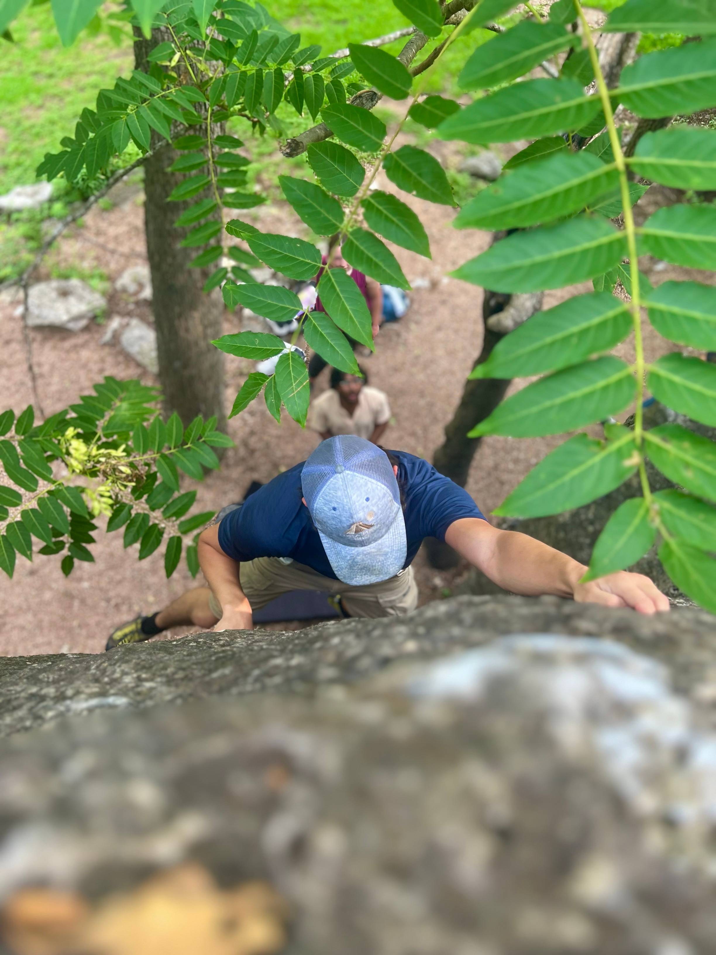 climbing sport club member climbing outdoors