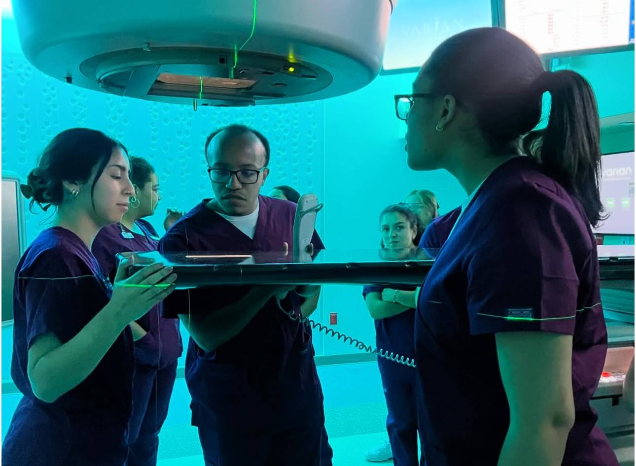 students in sim lab with clinical instructor