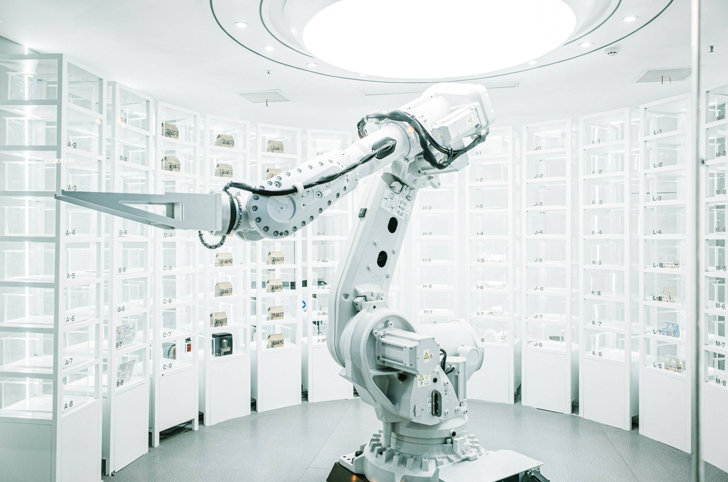 A robot hand lifting objects