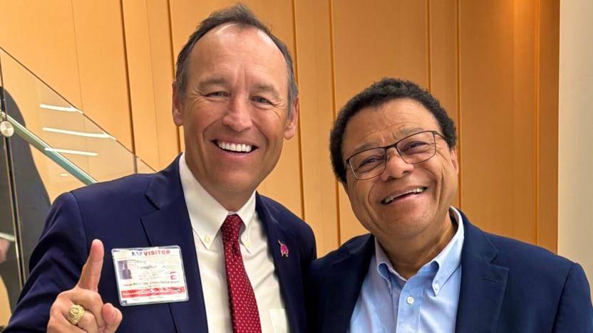 President Kelly Damphousse (left) poses for a photo with George Richter-Addo in D.C.