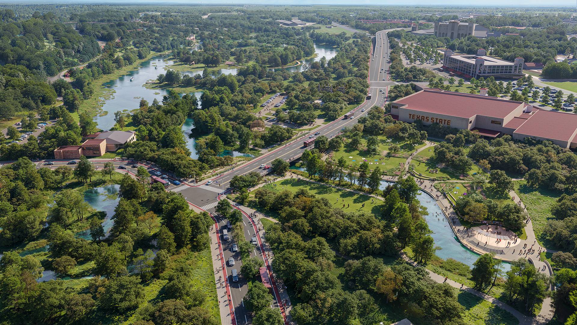 arial view of a river flowing through campus