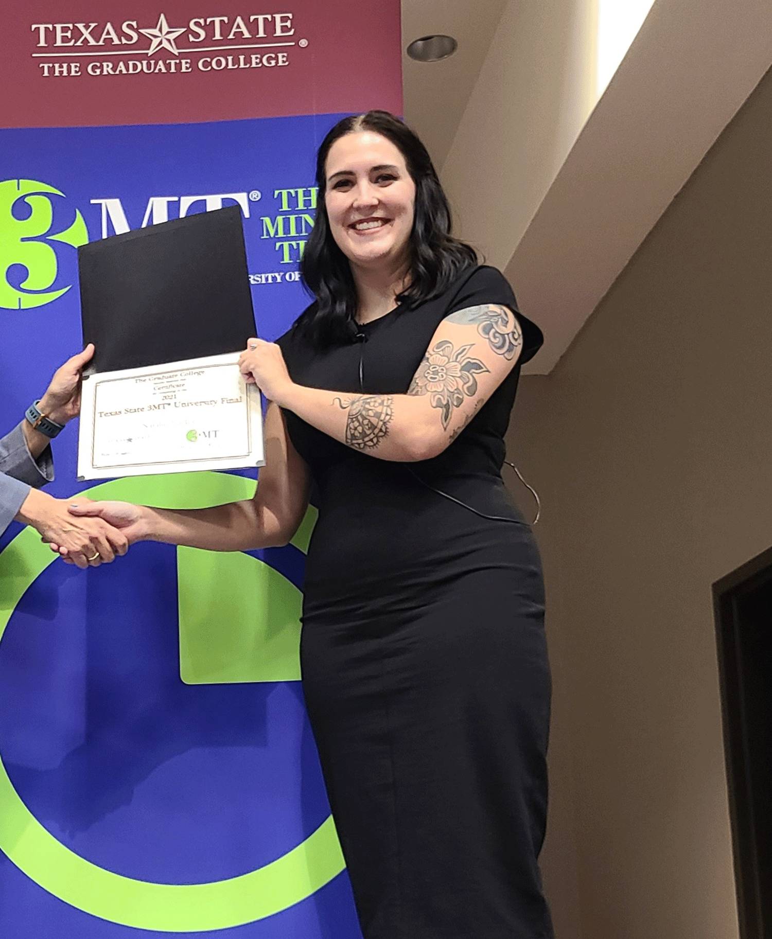 Natalie Tucker receiving an award