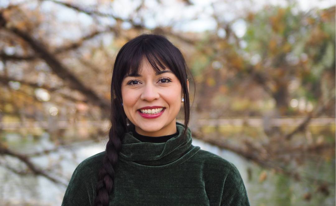 Isabella Vigil discusses her degree while walking around the Education building.