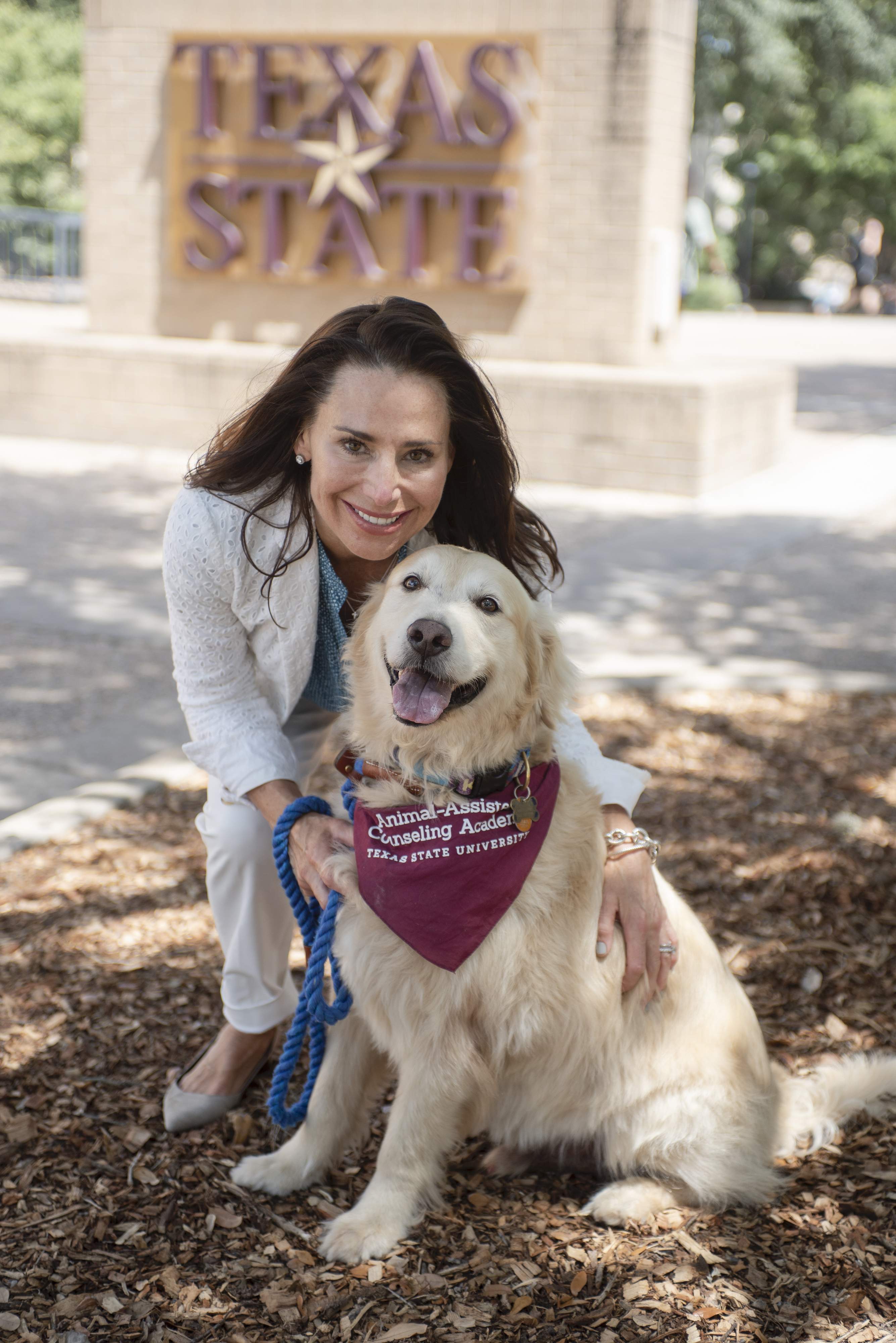 AAC Team Cindy & Charley in front of TXST sign