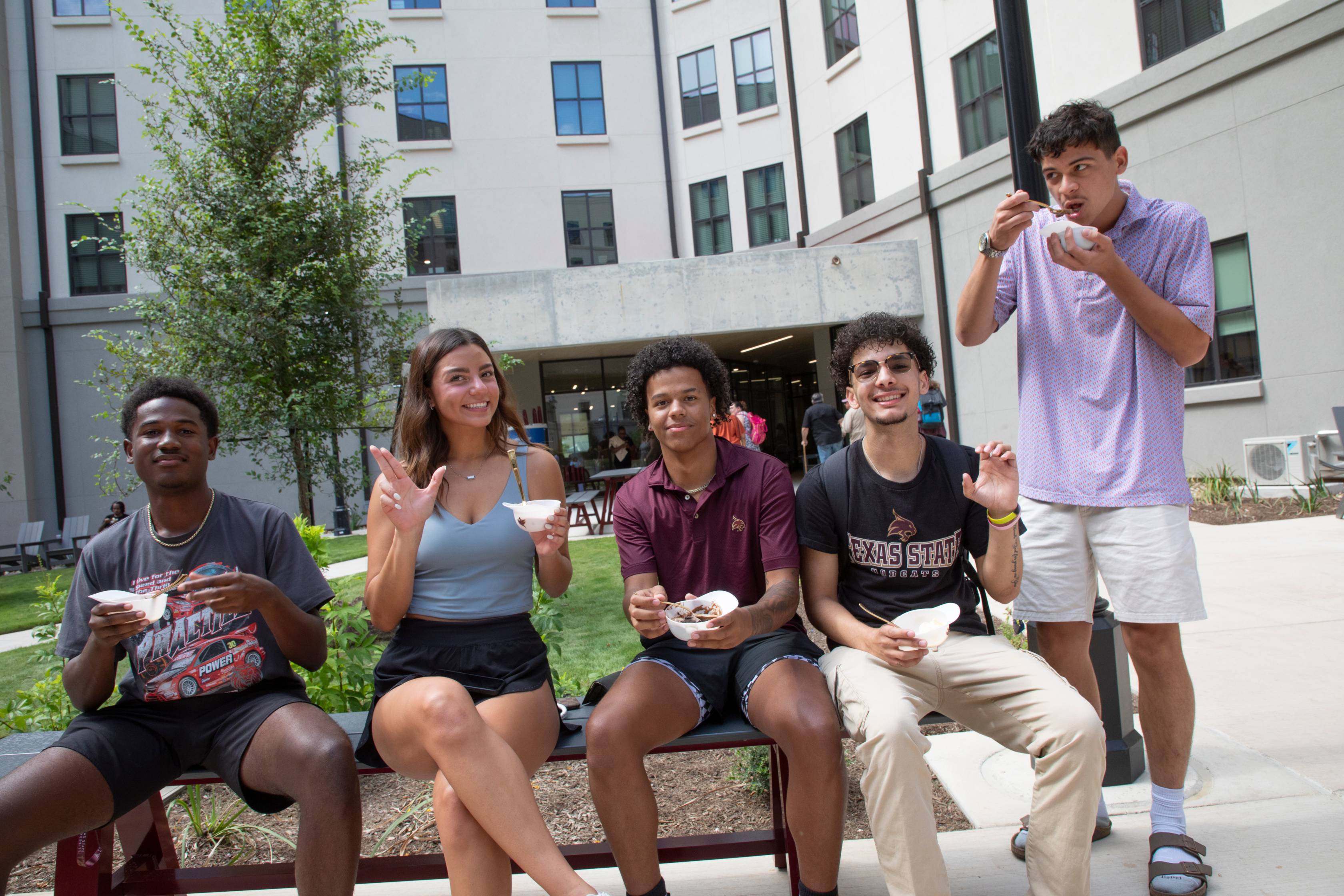students enjoying ice cream outside