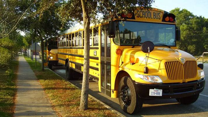 Yellow School Bus on Campus