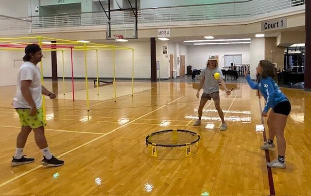 students playing spikeball
