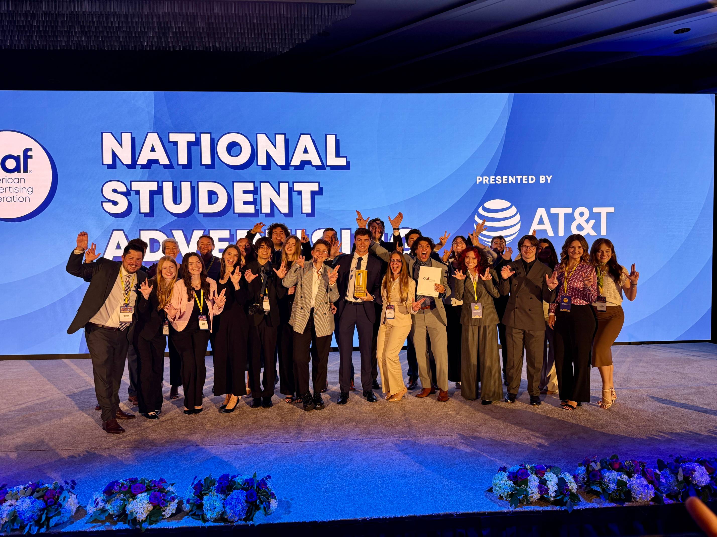a group of students on a stage 