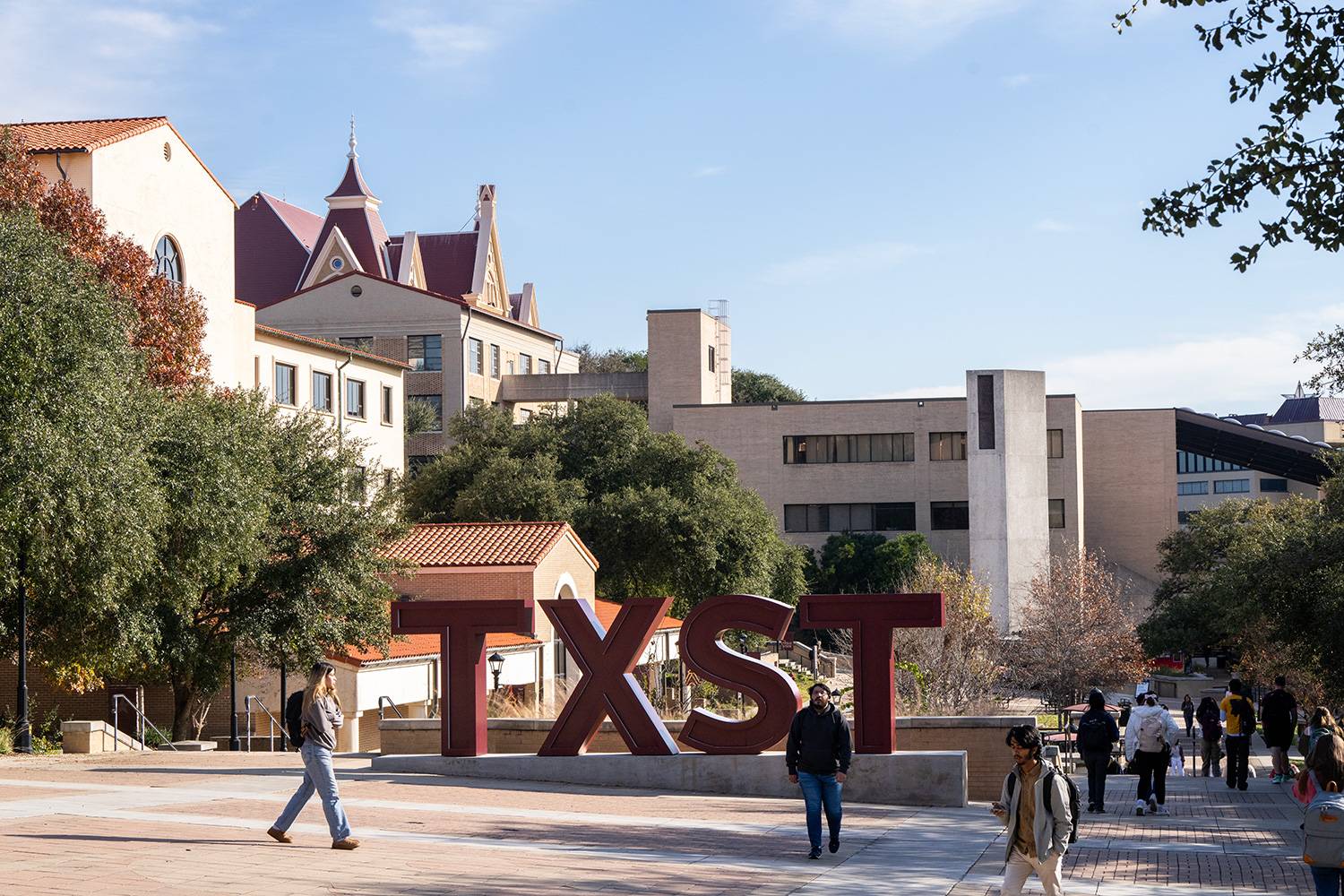 texas state university campus with students walking