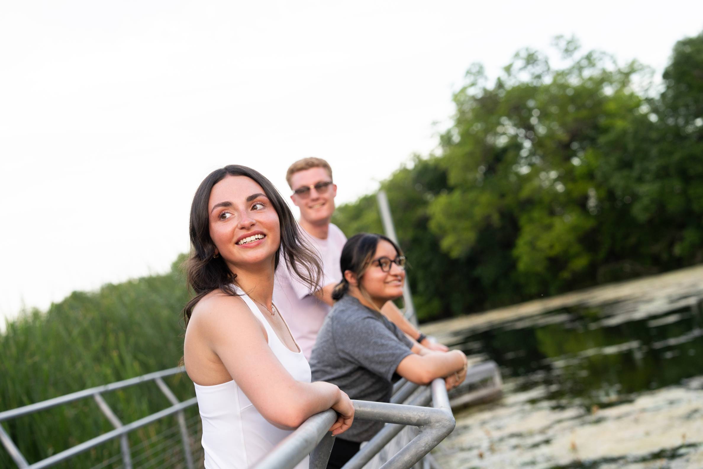 Students looking into river