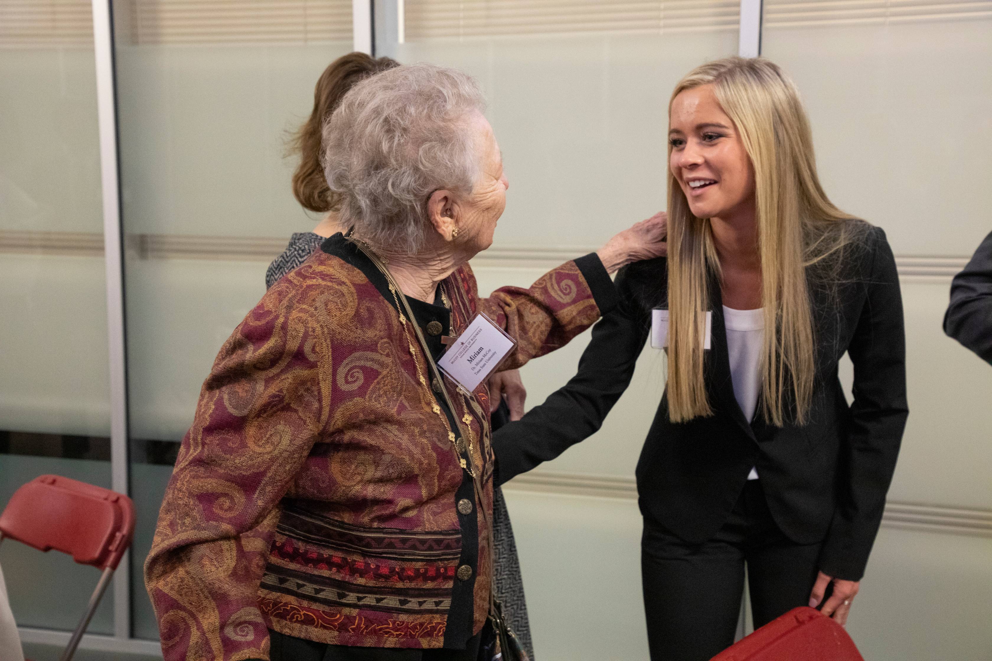 Woman introducing herself to the students. 