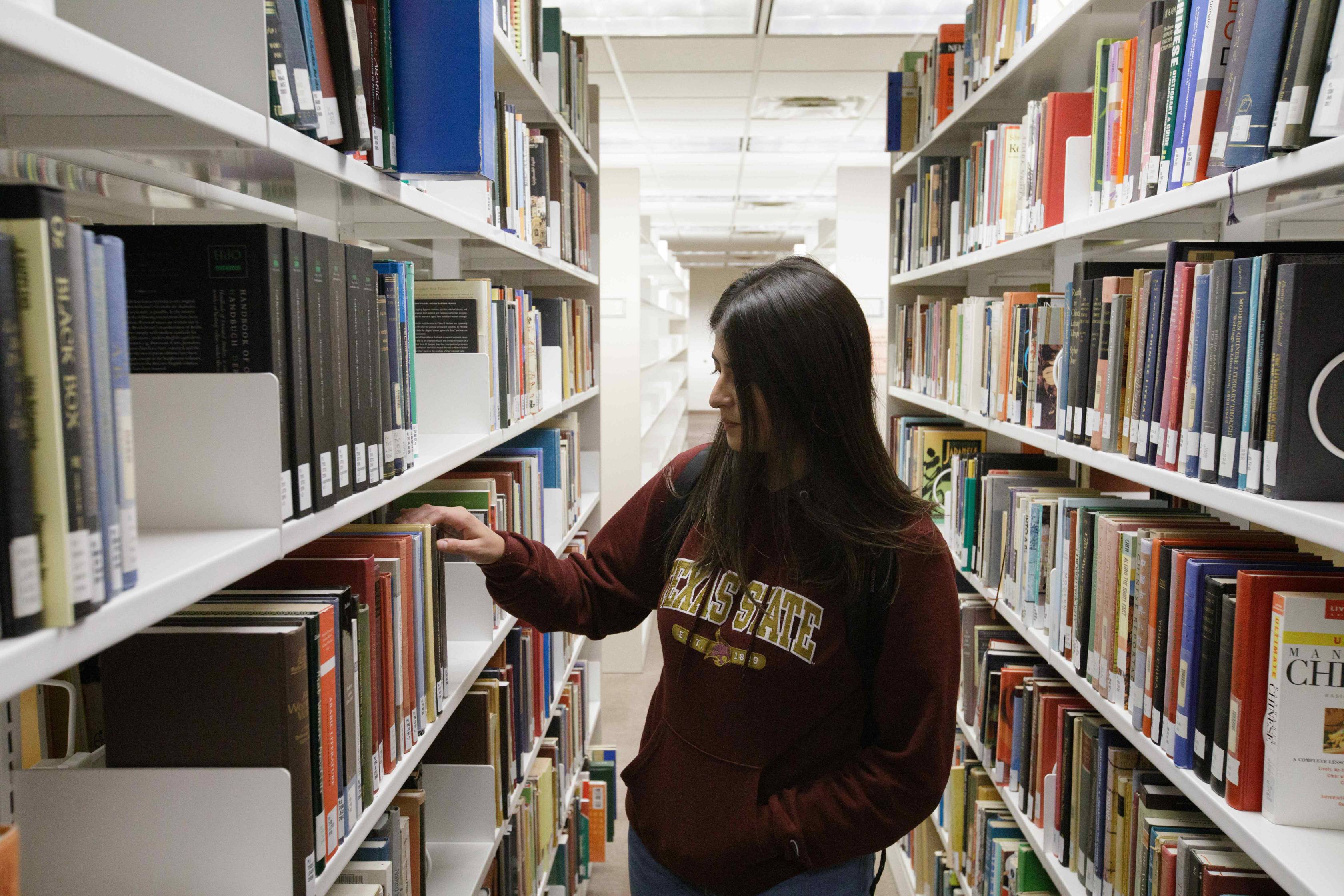 student looking for a book