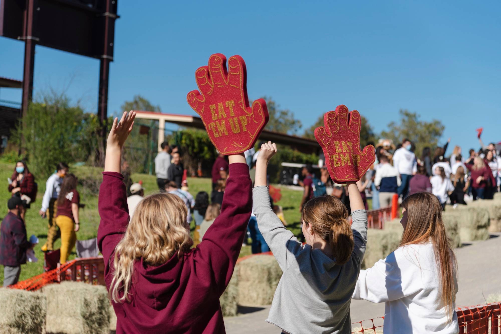 Texas State students cheering at a soap box derby race