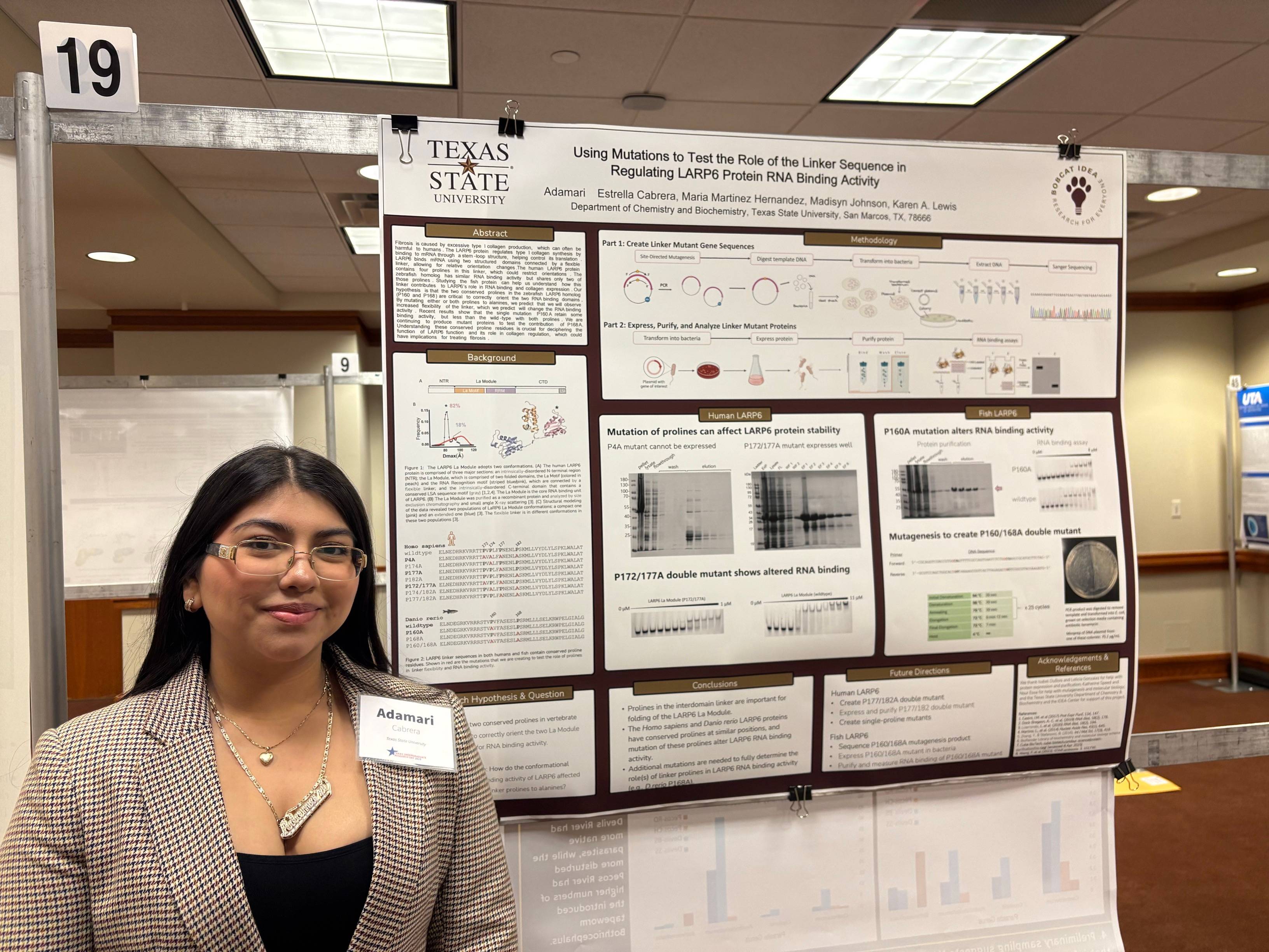 Student presenting poster research