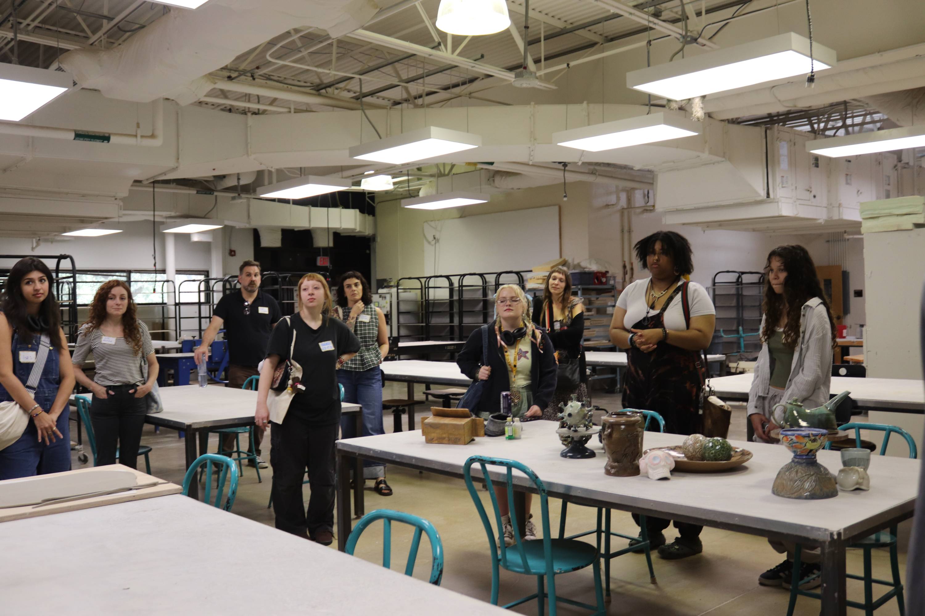 students gathered for a Ceramics presentation