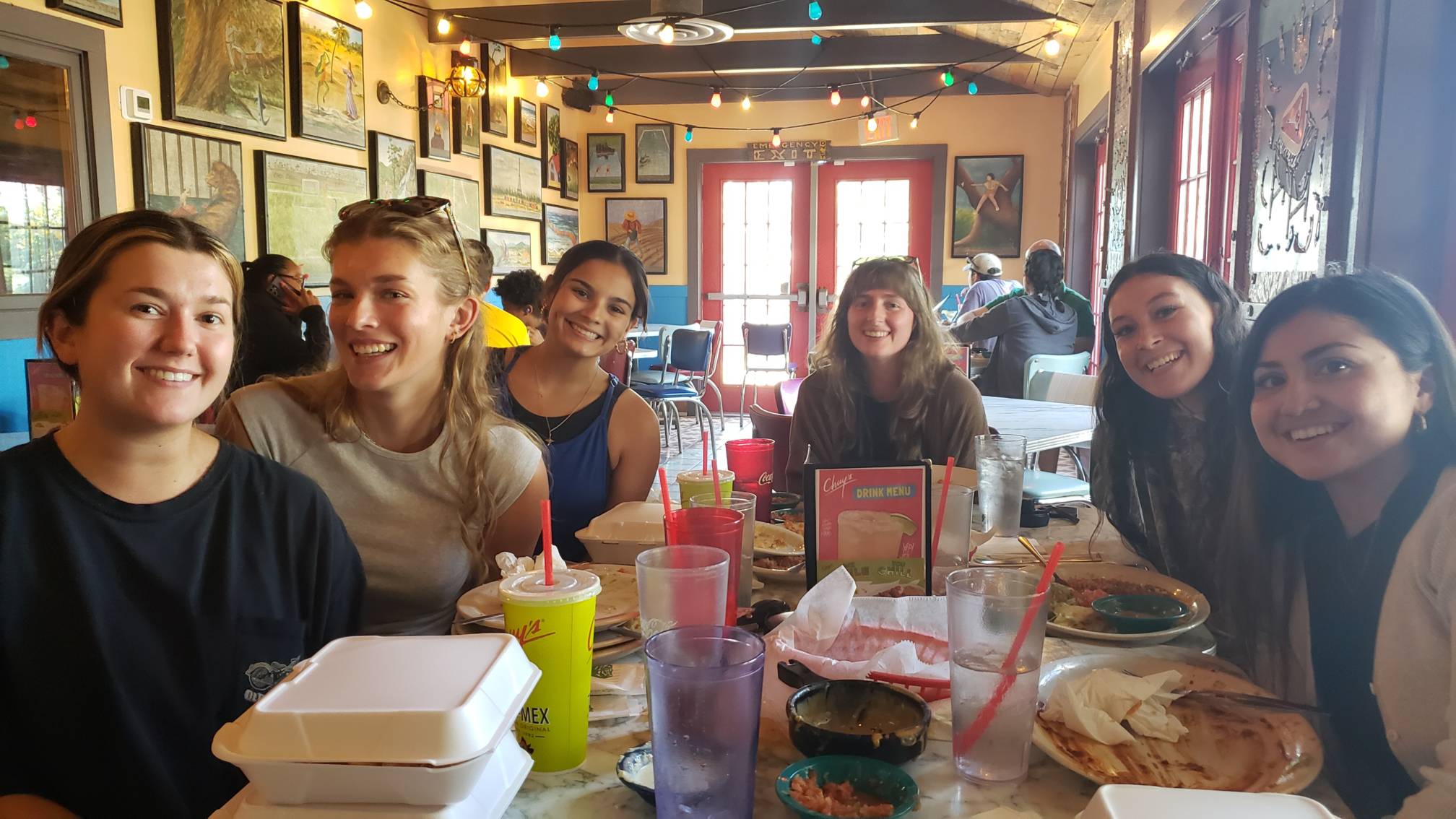 Lab members enjoying food from Chuy's restaurant.