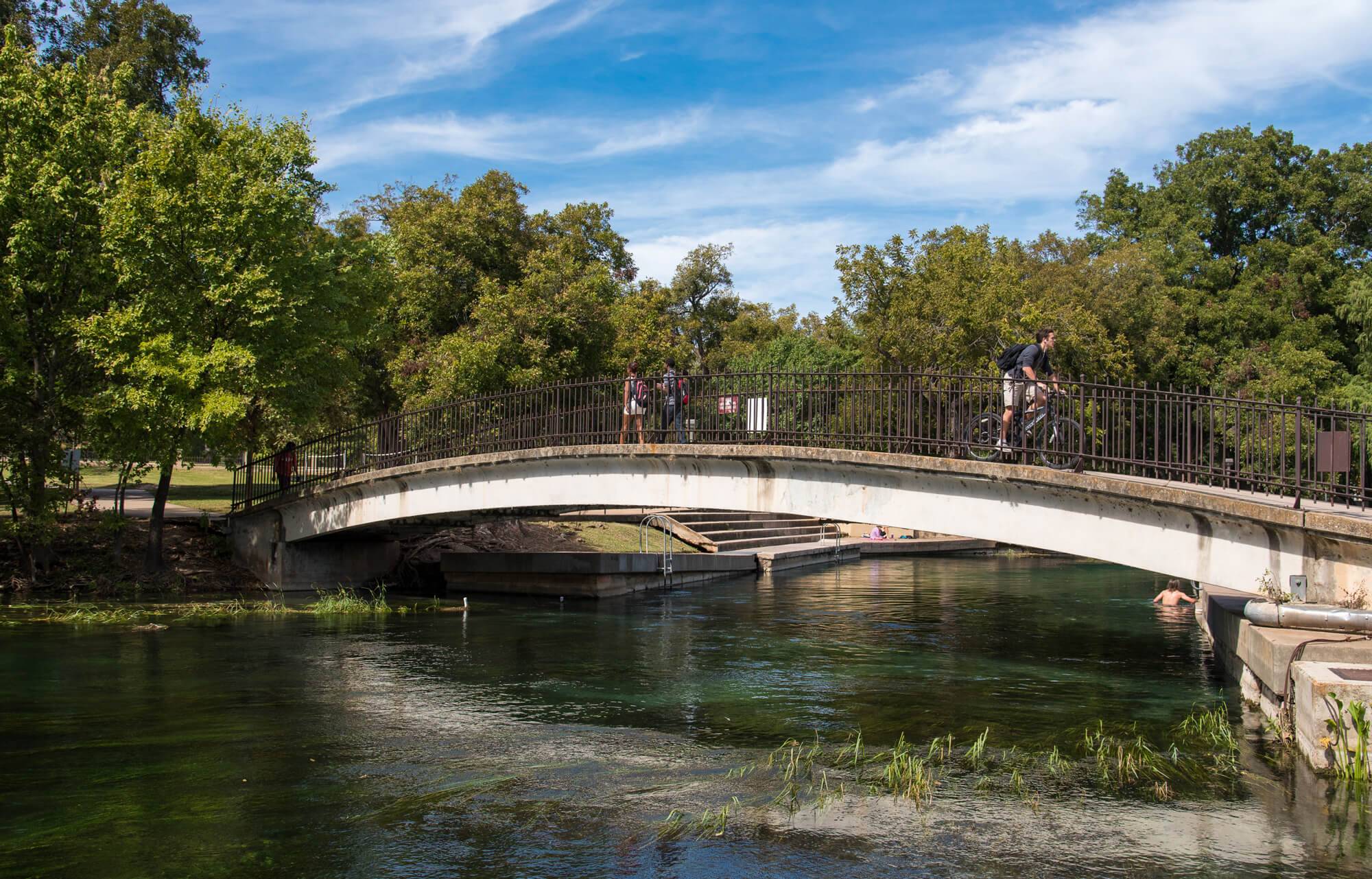 Image of students walking on bridge