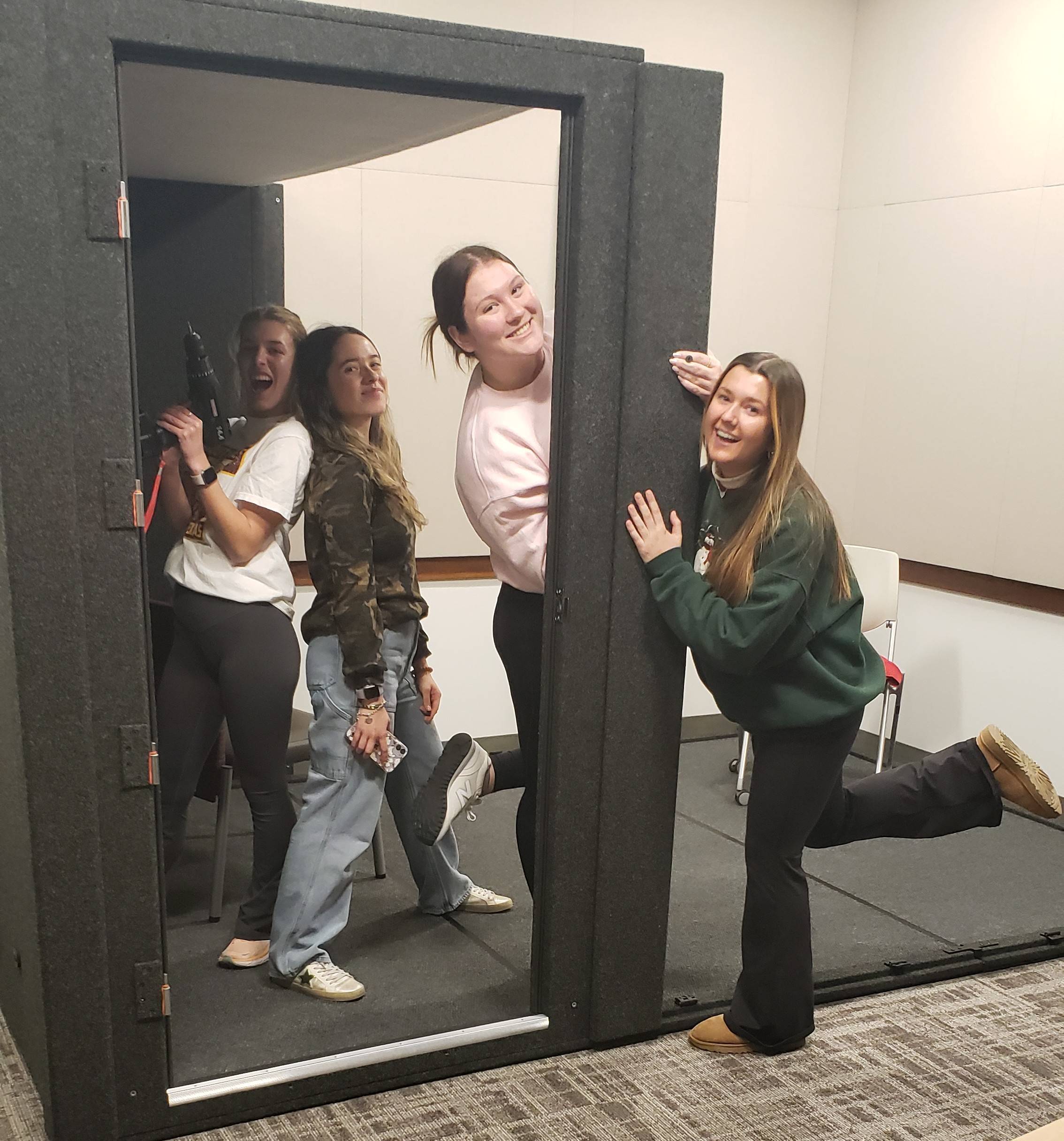 Lab members helping in a project.