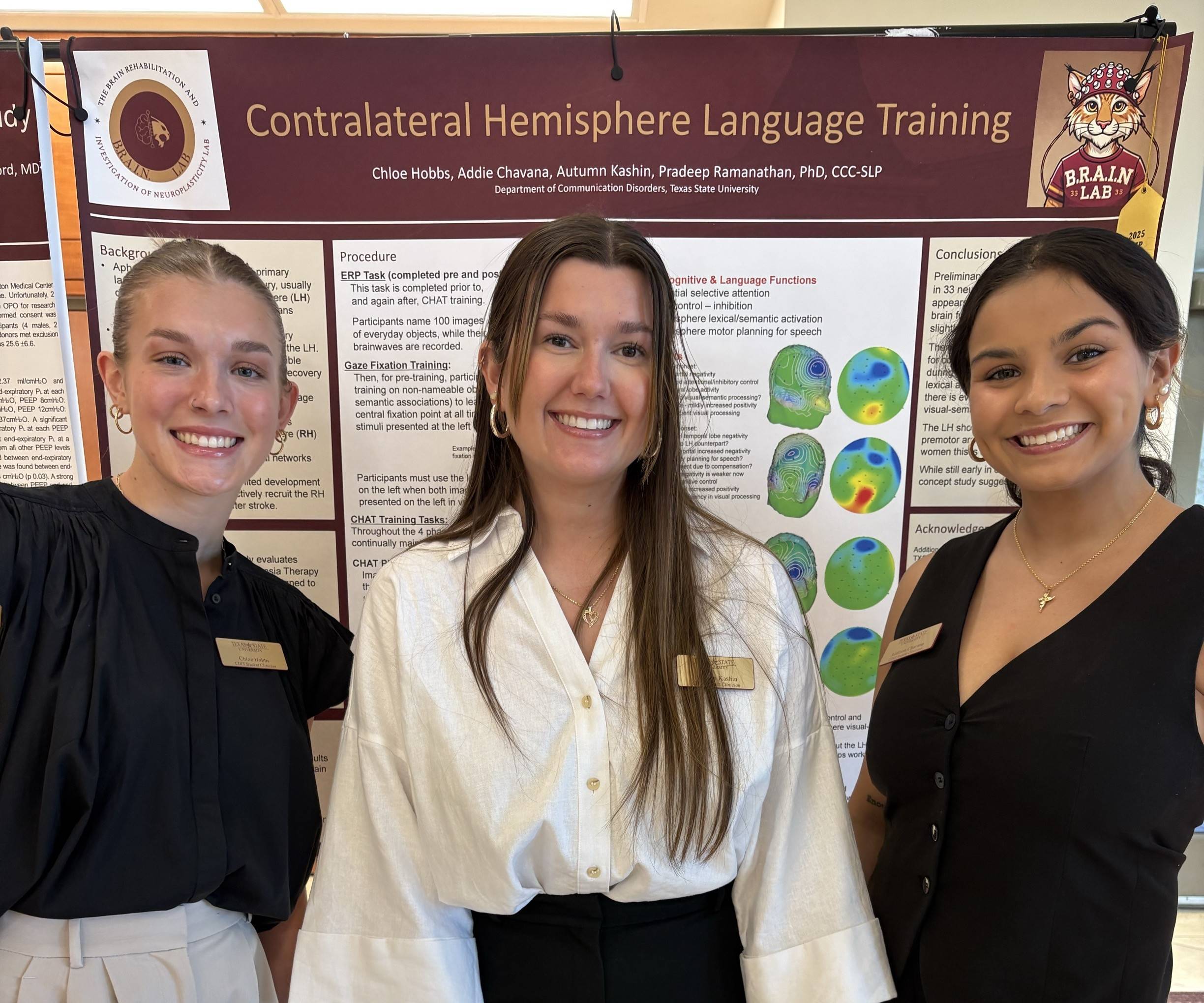 Lab members presenting a research poster during the College of Health Professions Research Forum.