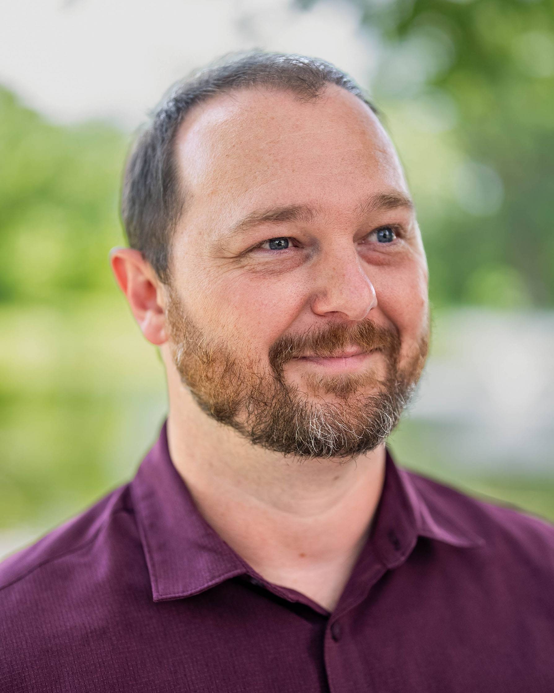 Headshot of Adam Clark.