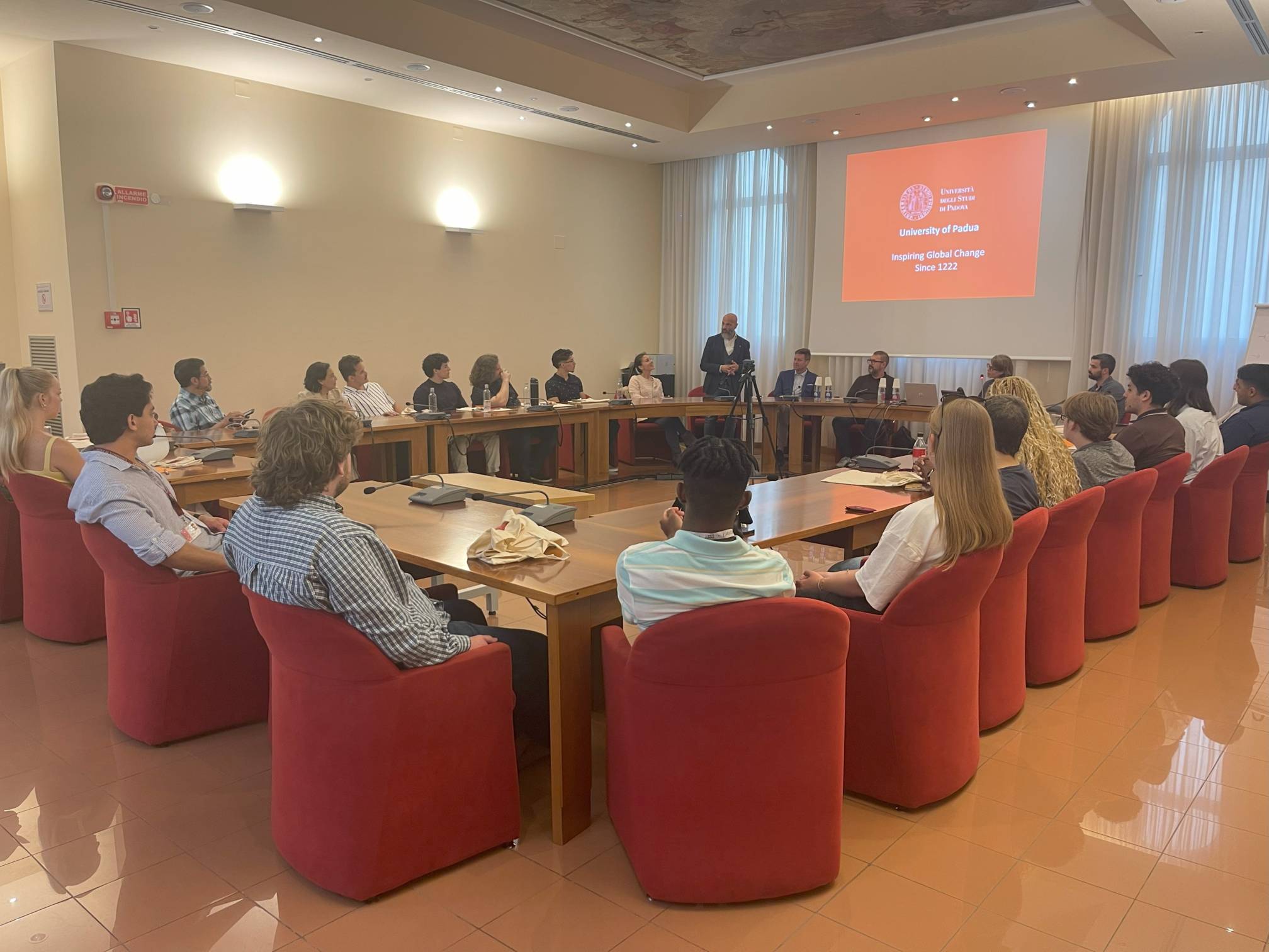 Students watching presentation at UNIPD conference room