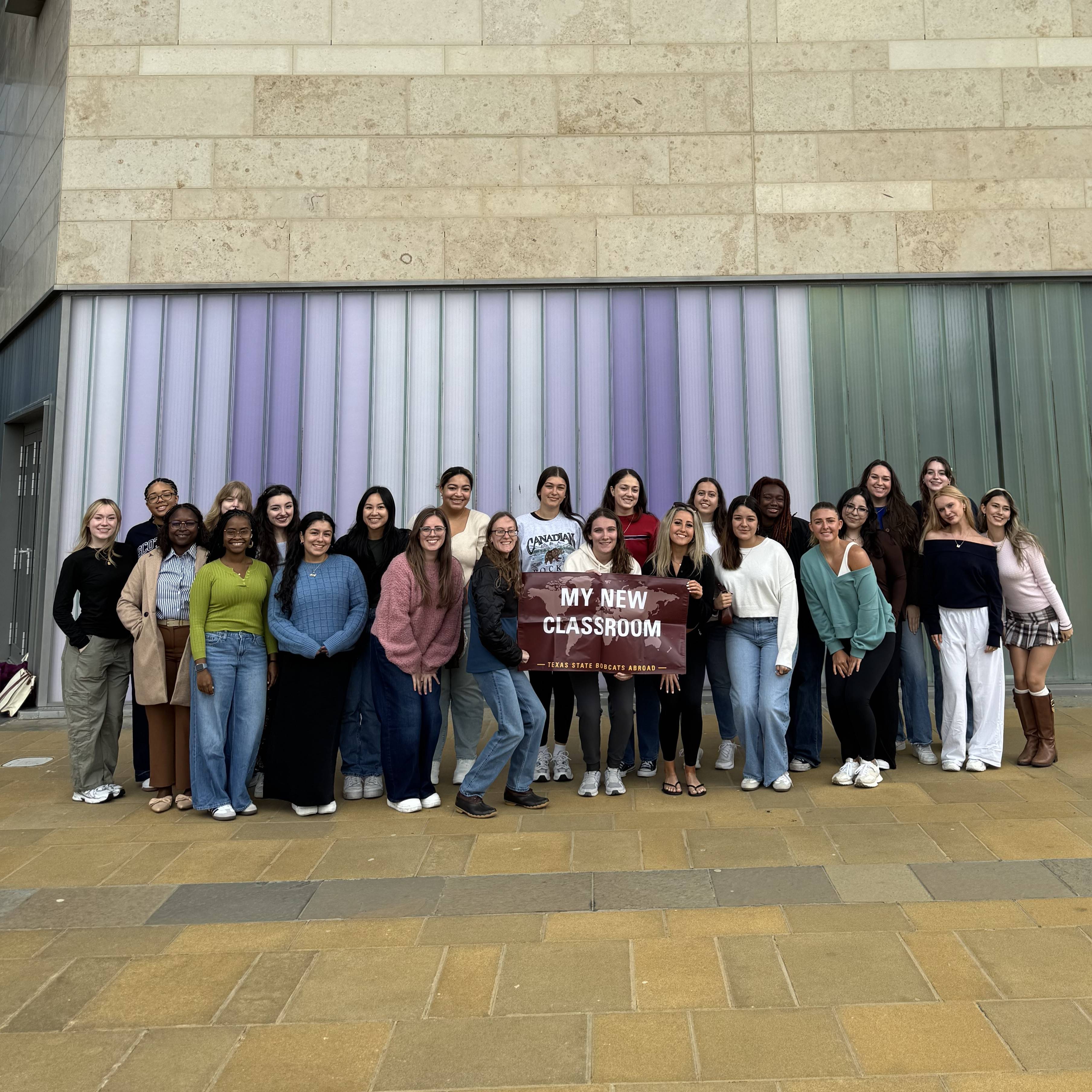 Group of students outside UHI main academic building