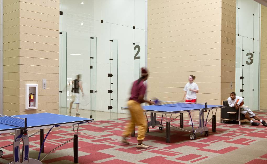 Students playing table tennis