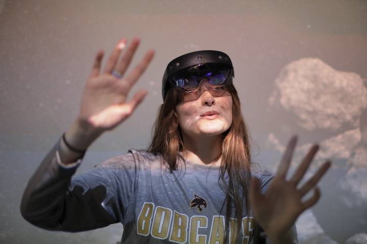 Student interacting with a VR