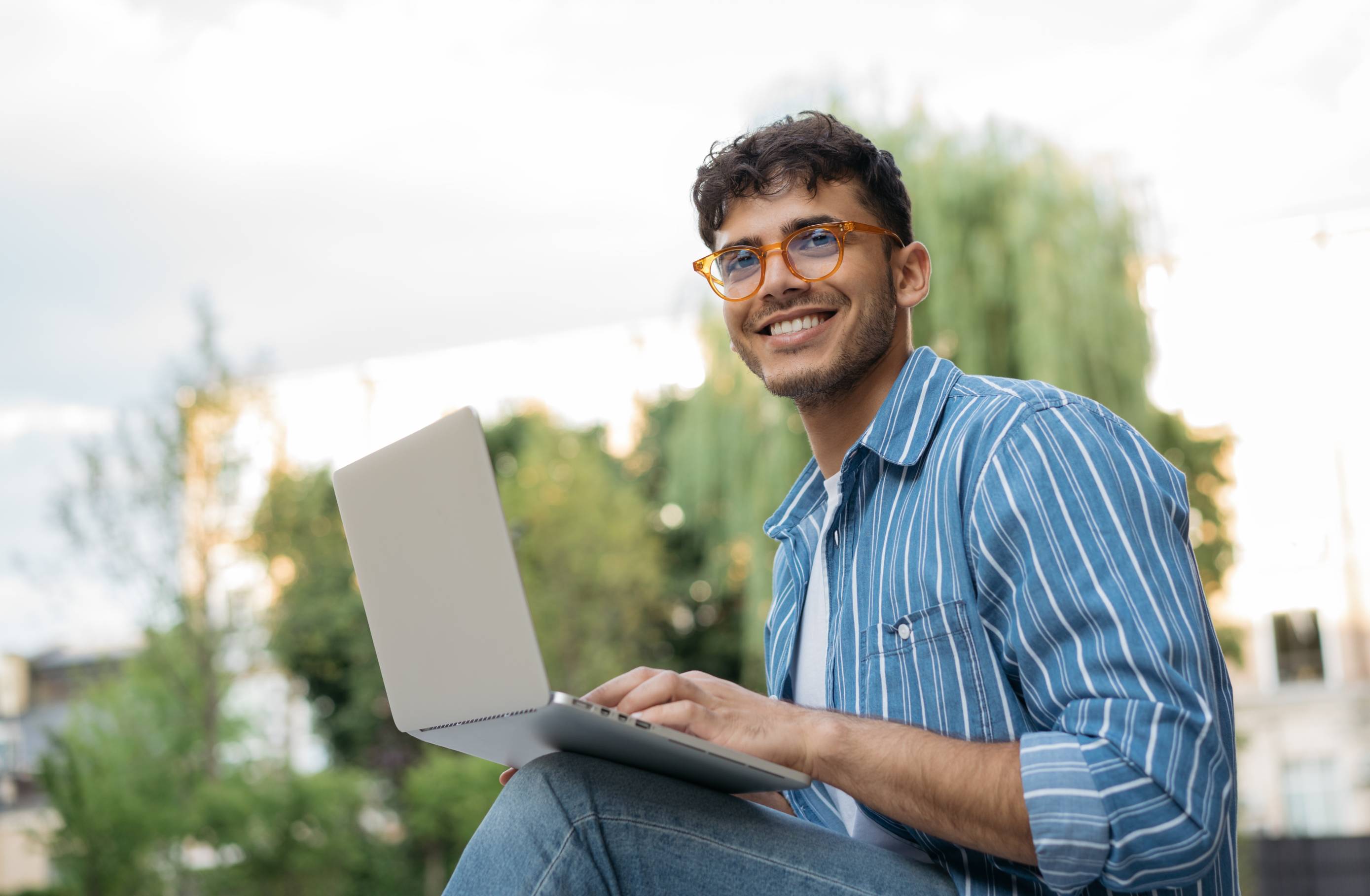 Student studying on a laptop.