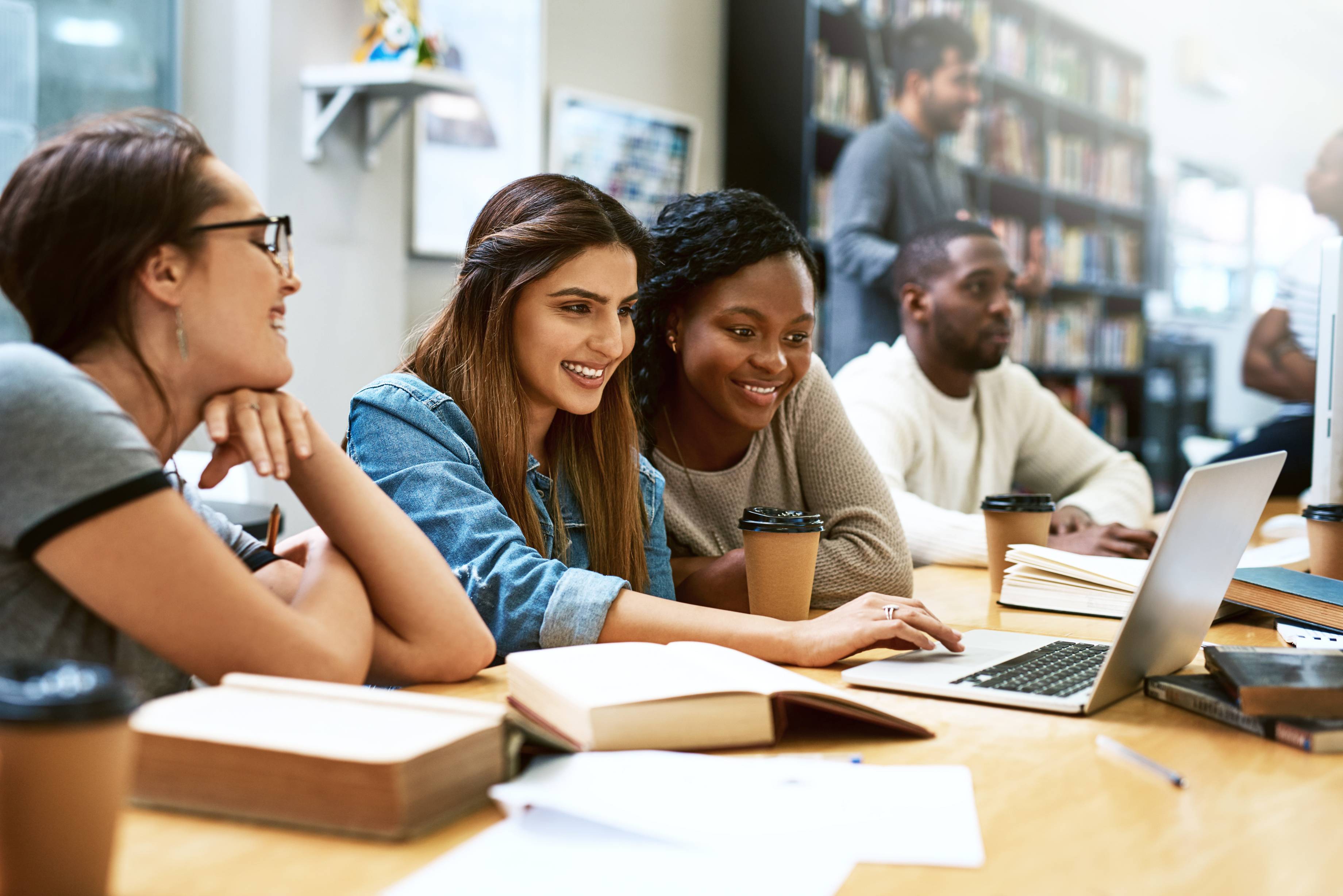 Students studying together for online class