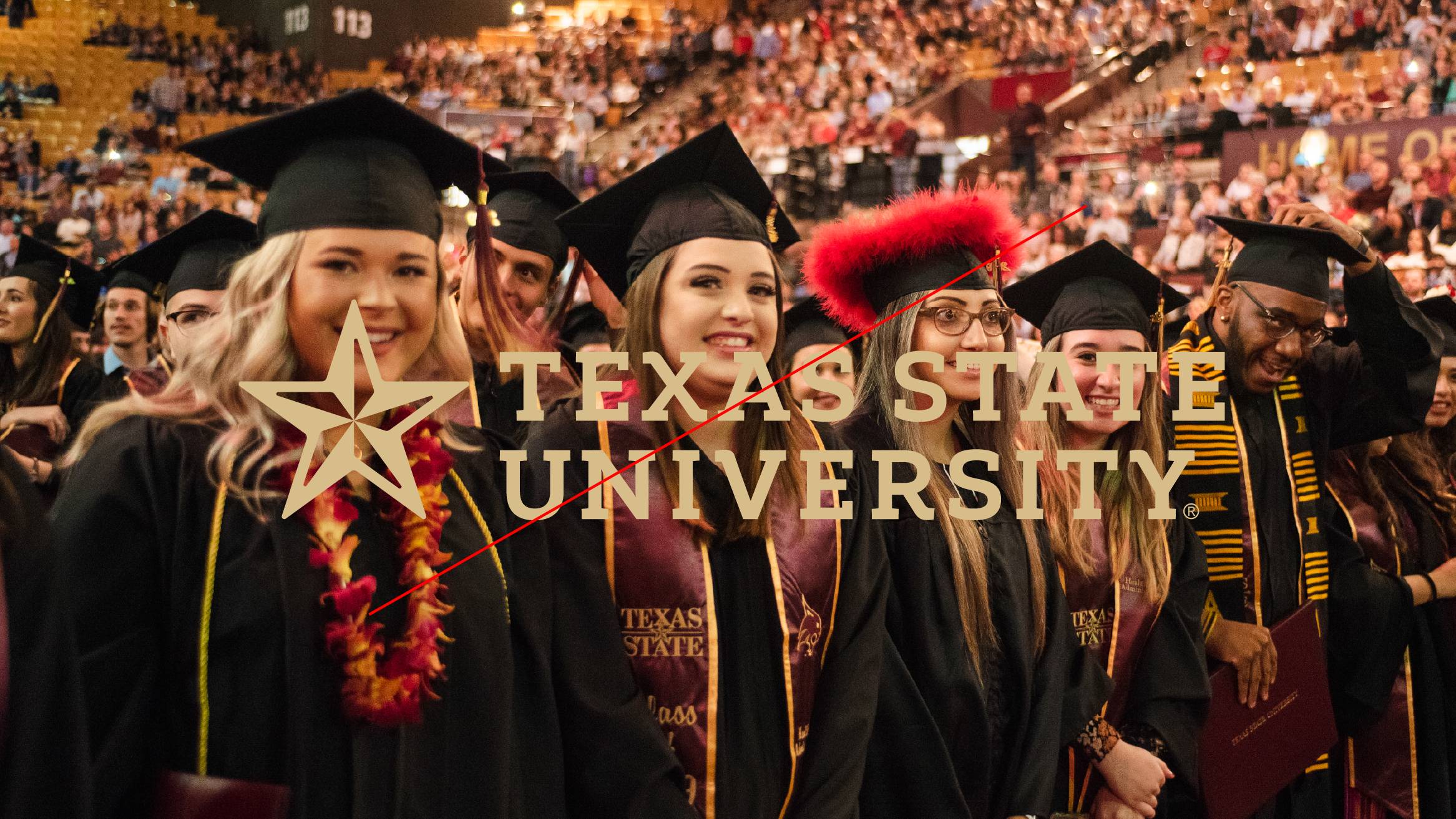 Faint gold logo over a busy, dark background picture of students at graduation