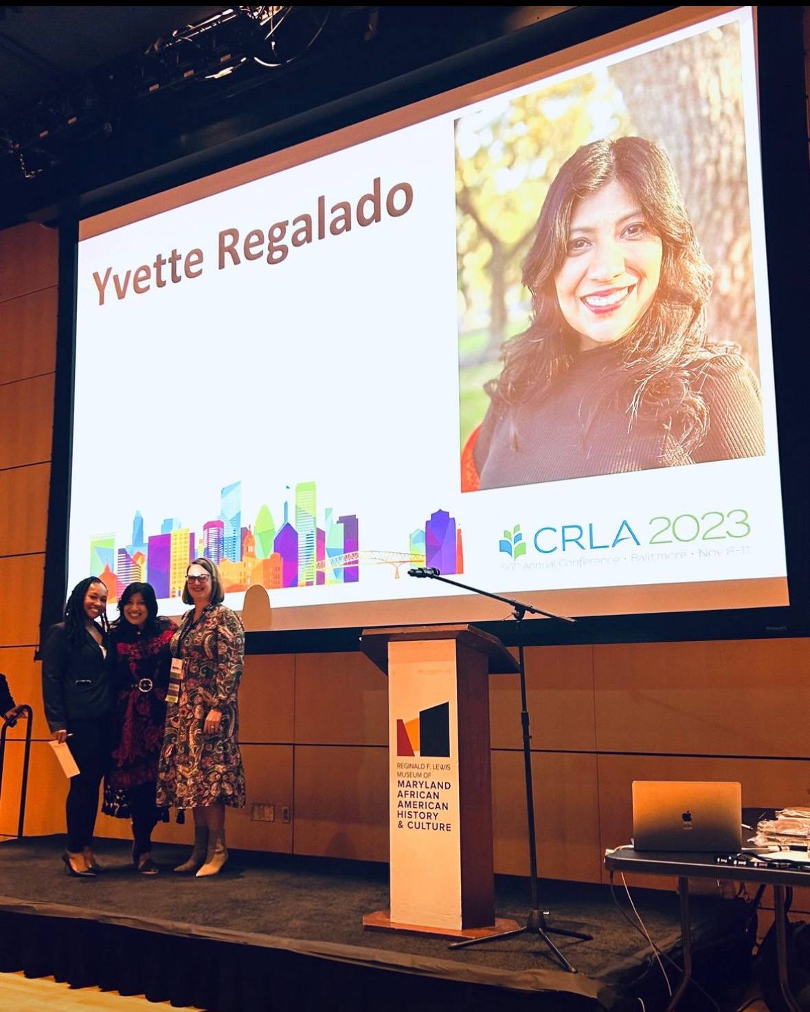 Regalado receives a $1,000 scholarship award at the College Reading and Learning Association conference for her dissertation.