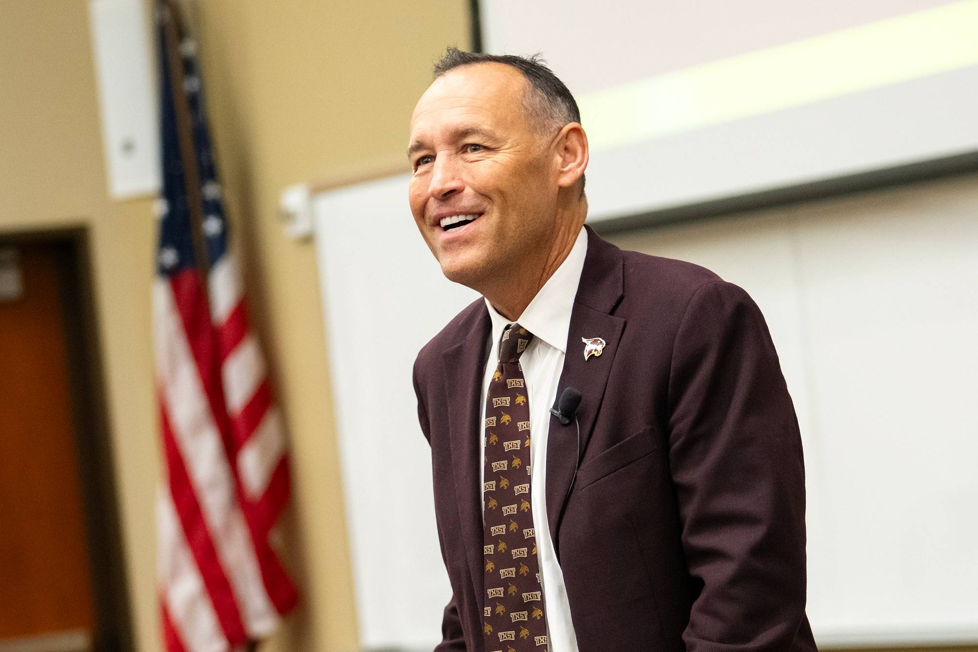 Kelly Damphousse speaking in a classroom
