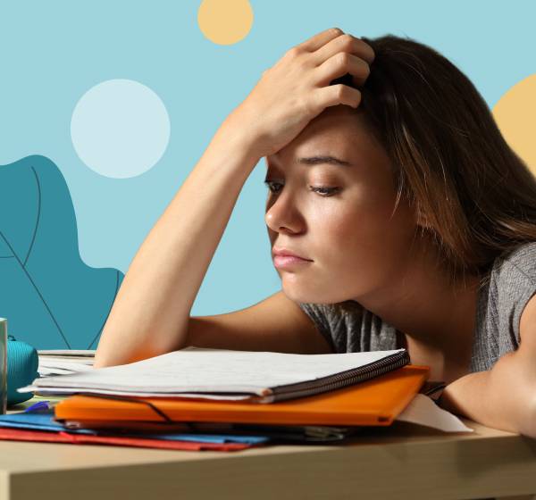 person with hand to head in stress