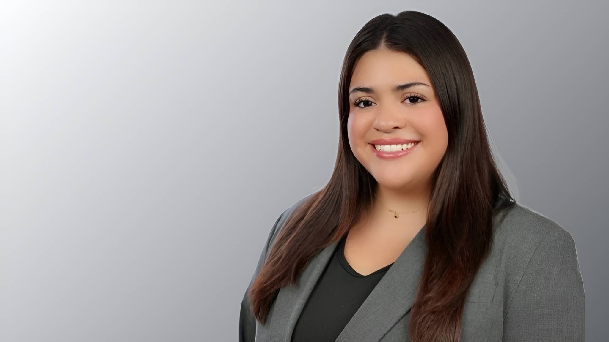girl smiling for head shot 