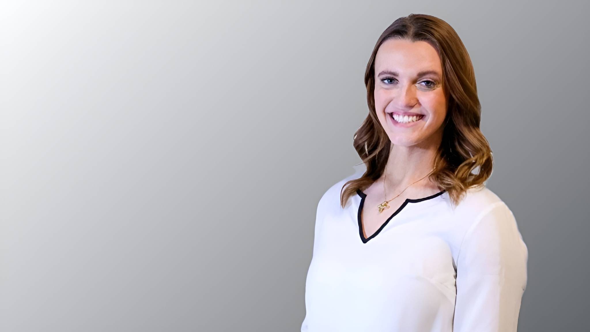 girl smiling for headshot