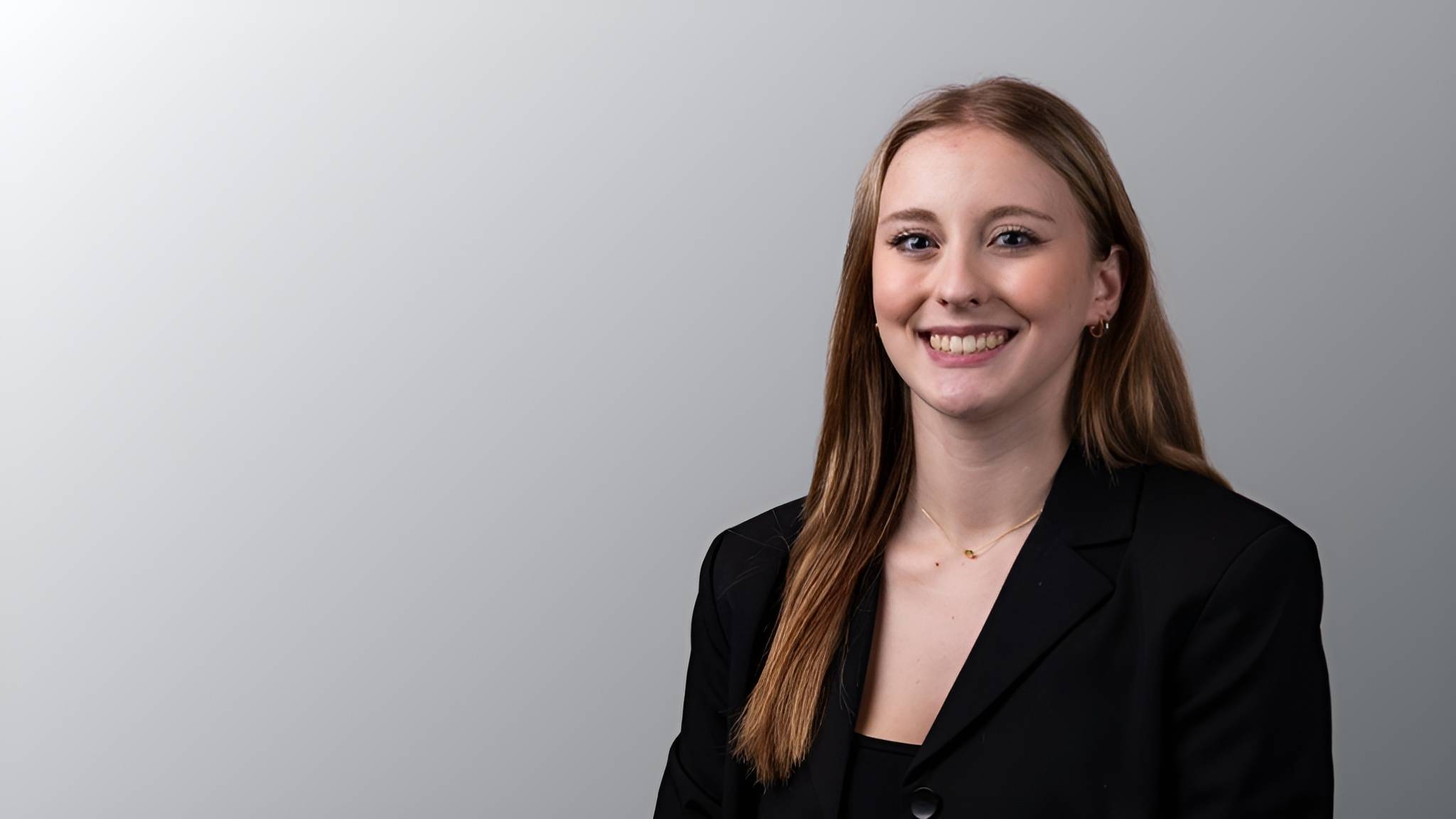 GIRL SMILING FOR HEADSHOT