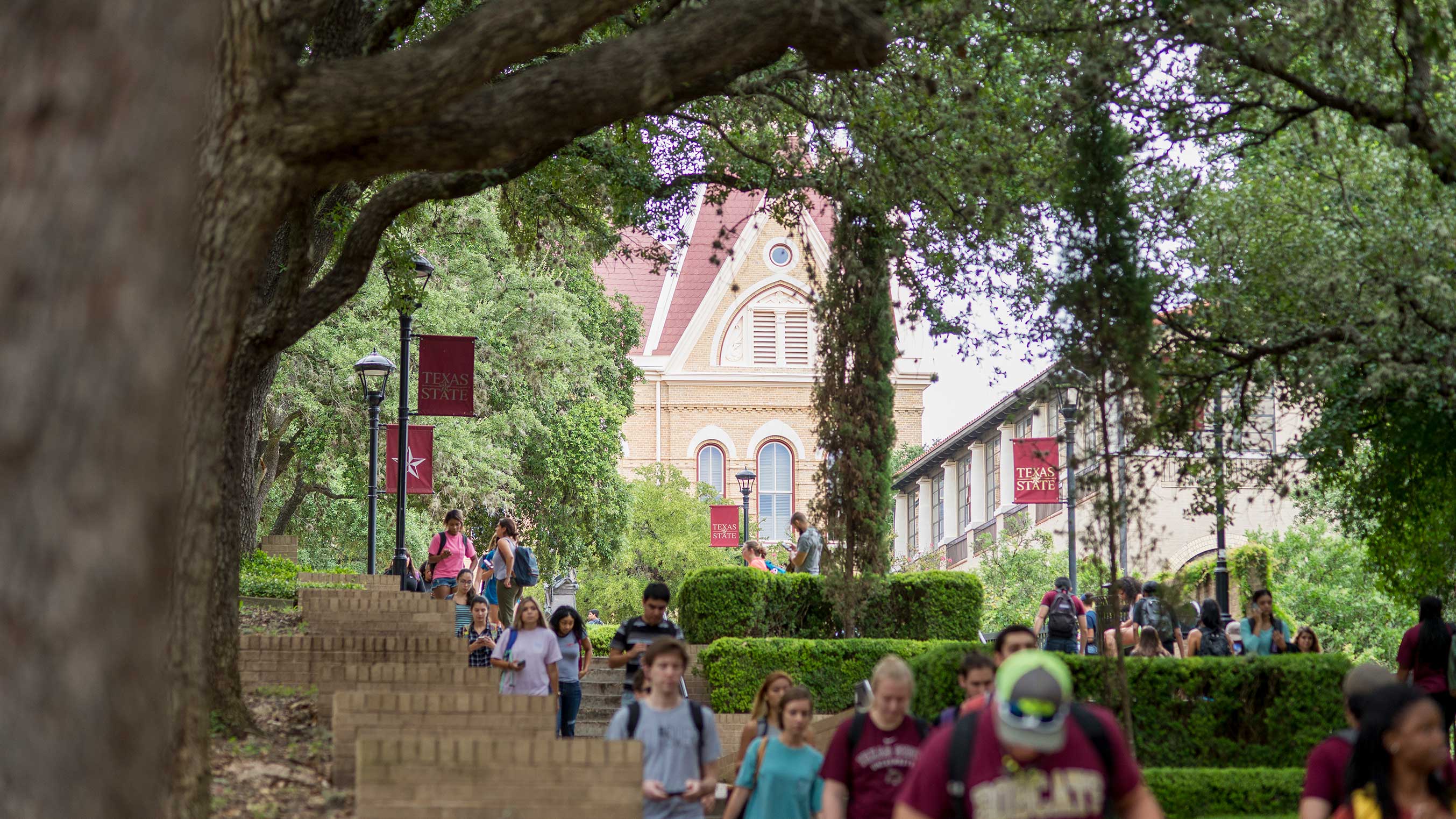 Photo of students walking on campus.