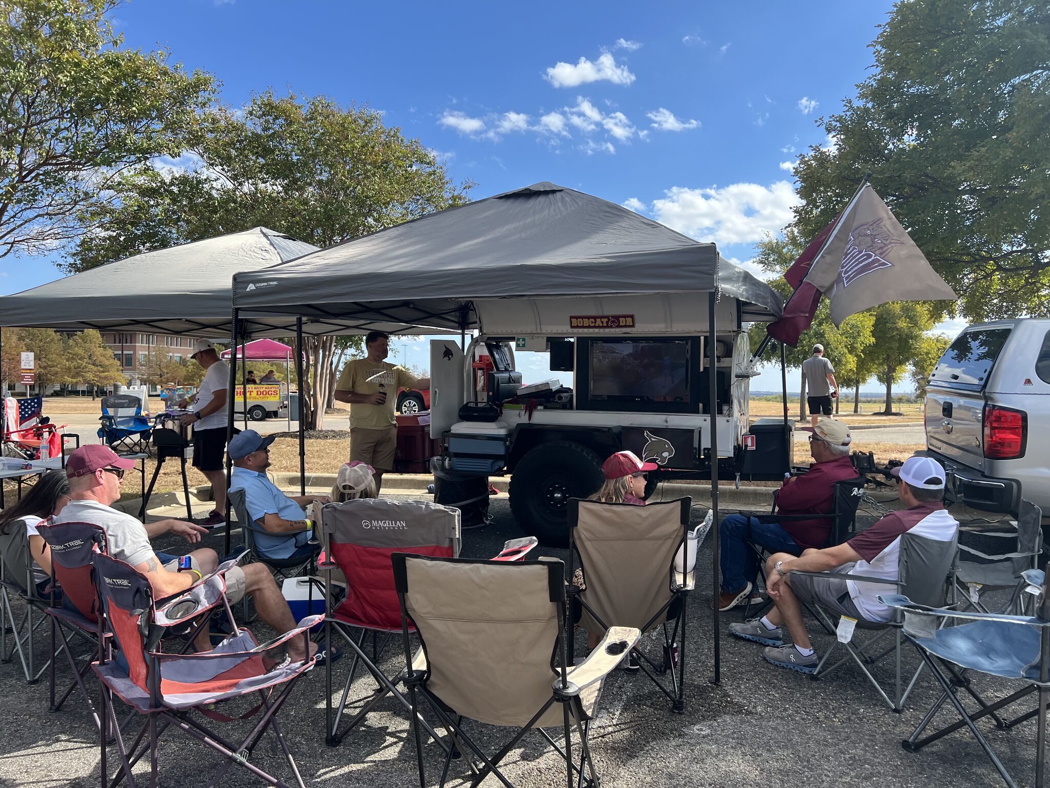 people tailgating on campus