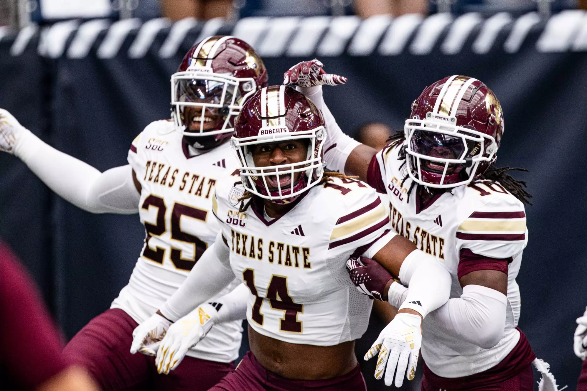 three football players