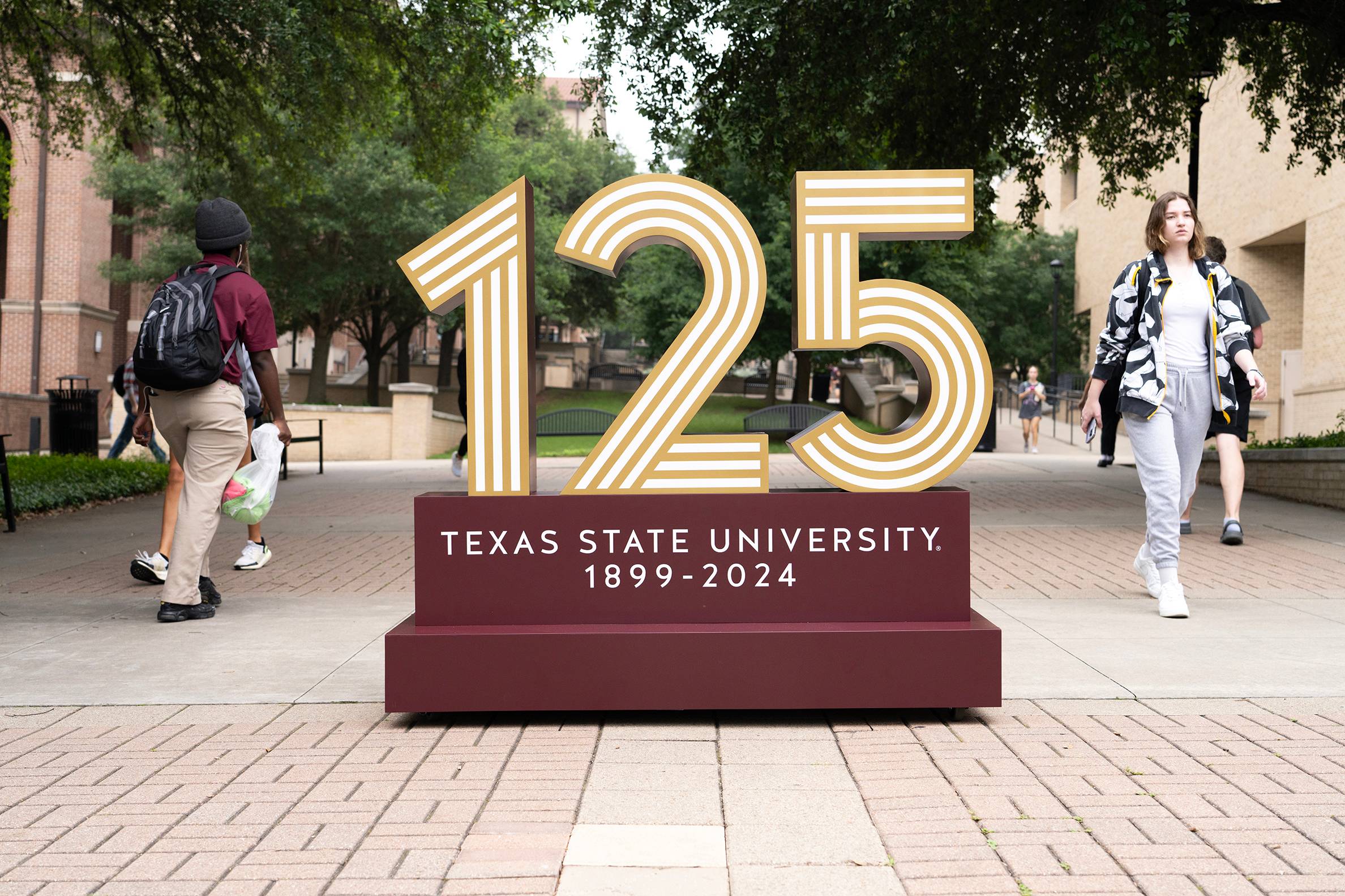 large sign in the quad that reads 125