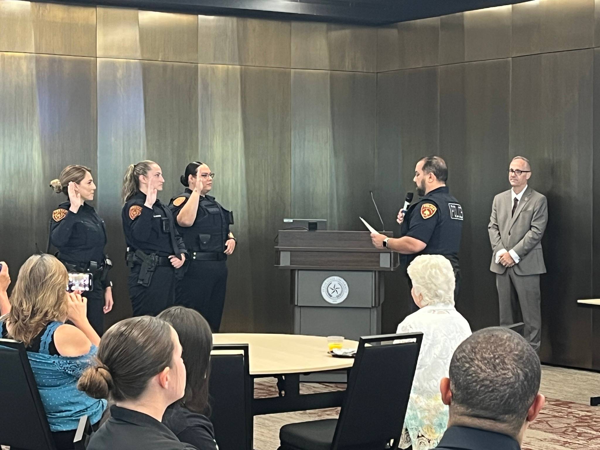 Swearing in Officers Coody, LaCasse, and Grijalva