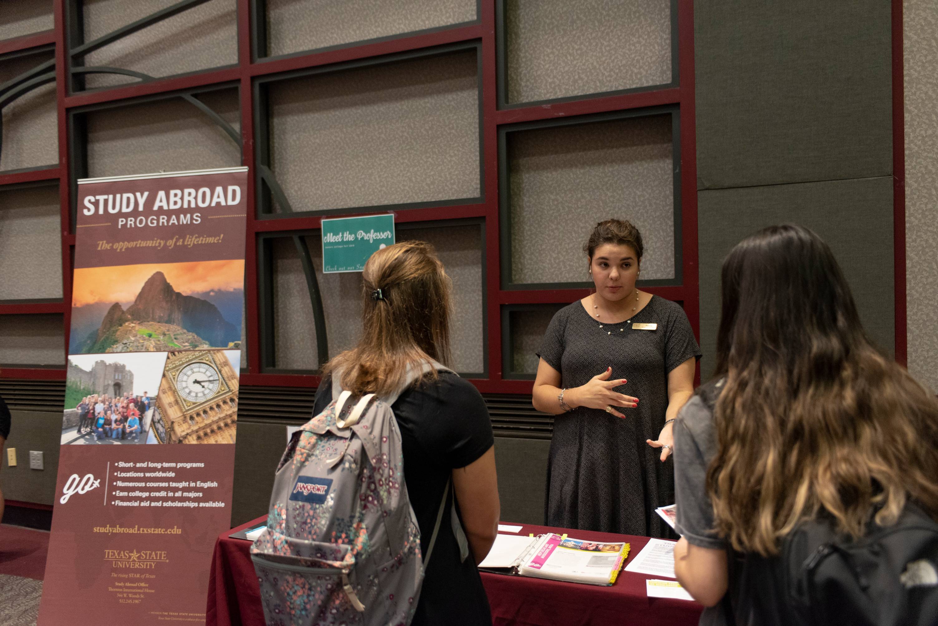 Texas State study abroad student giving a presentation at an on-campus event