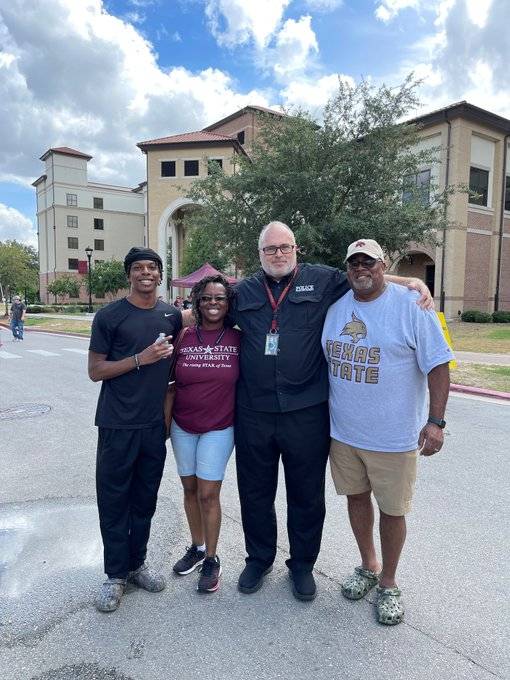 Chief with parents at move-in