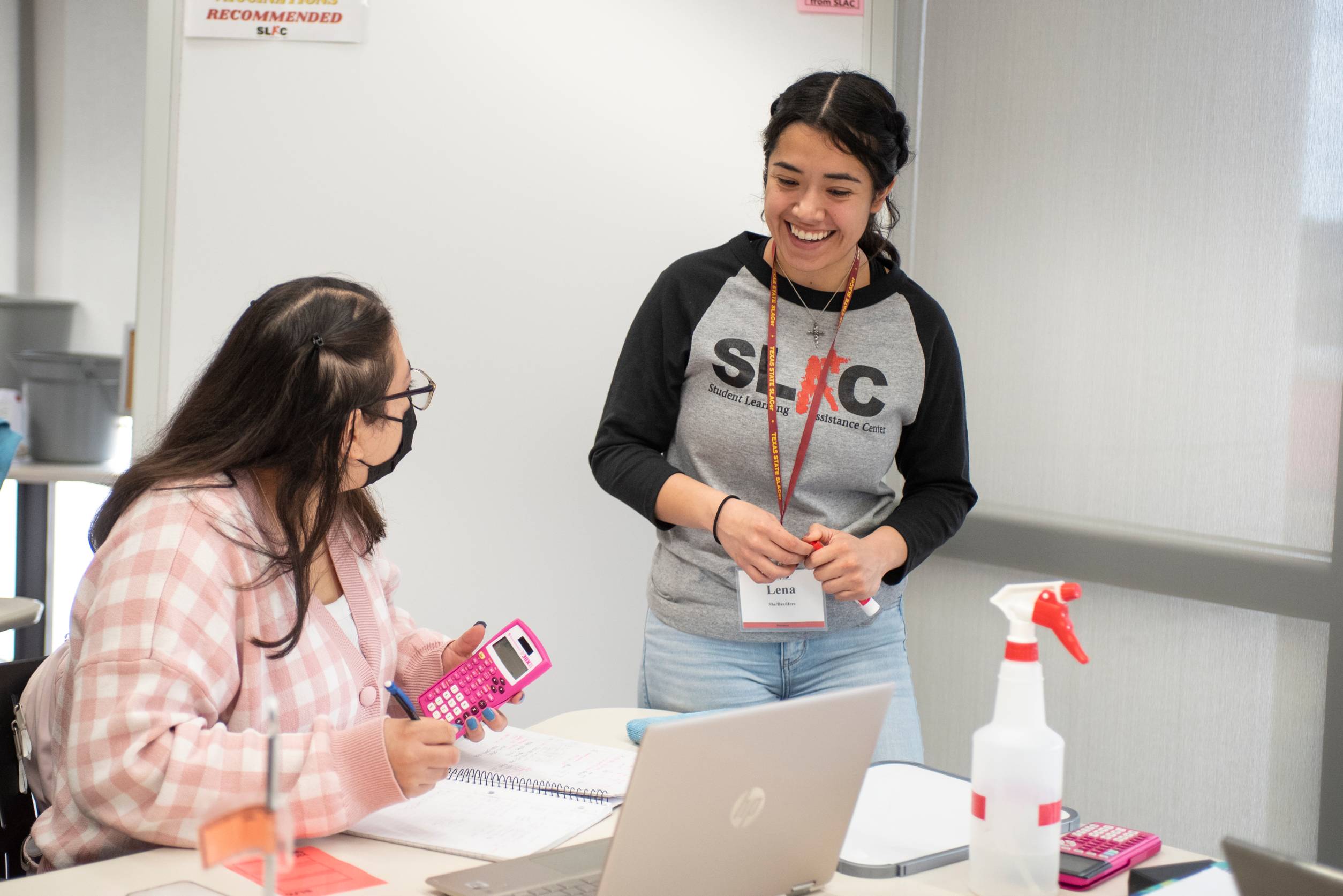 Photo of a student being tutored at SLAC.