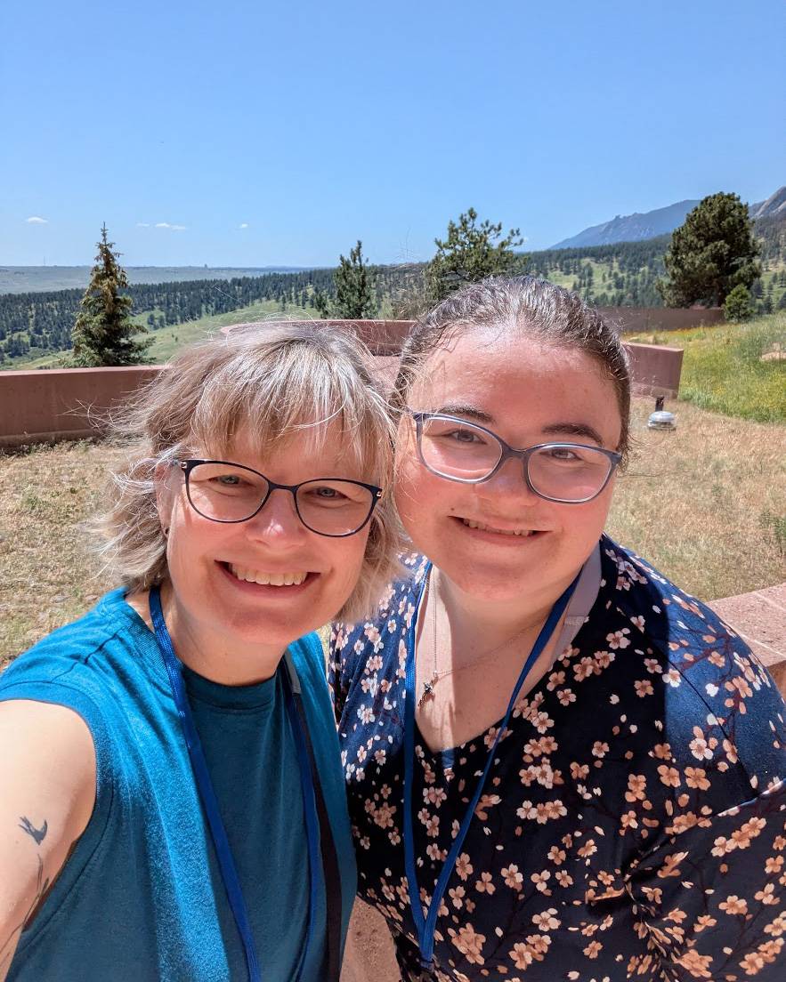 Graves (left) and Koehler pose for a photo outside.