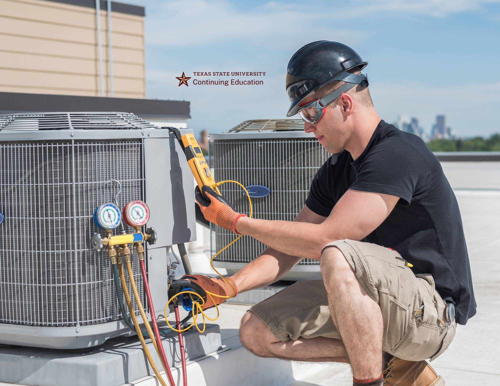hvac technician in work gear monitoring freon level in ac