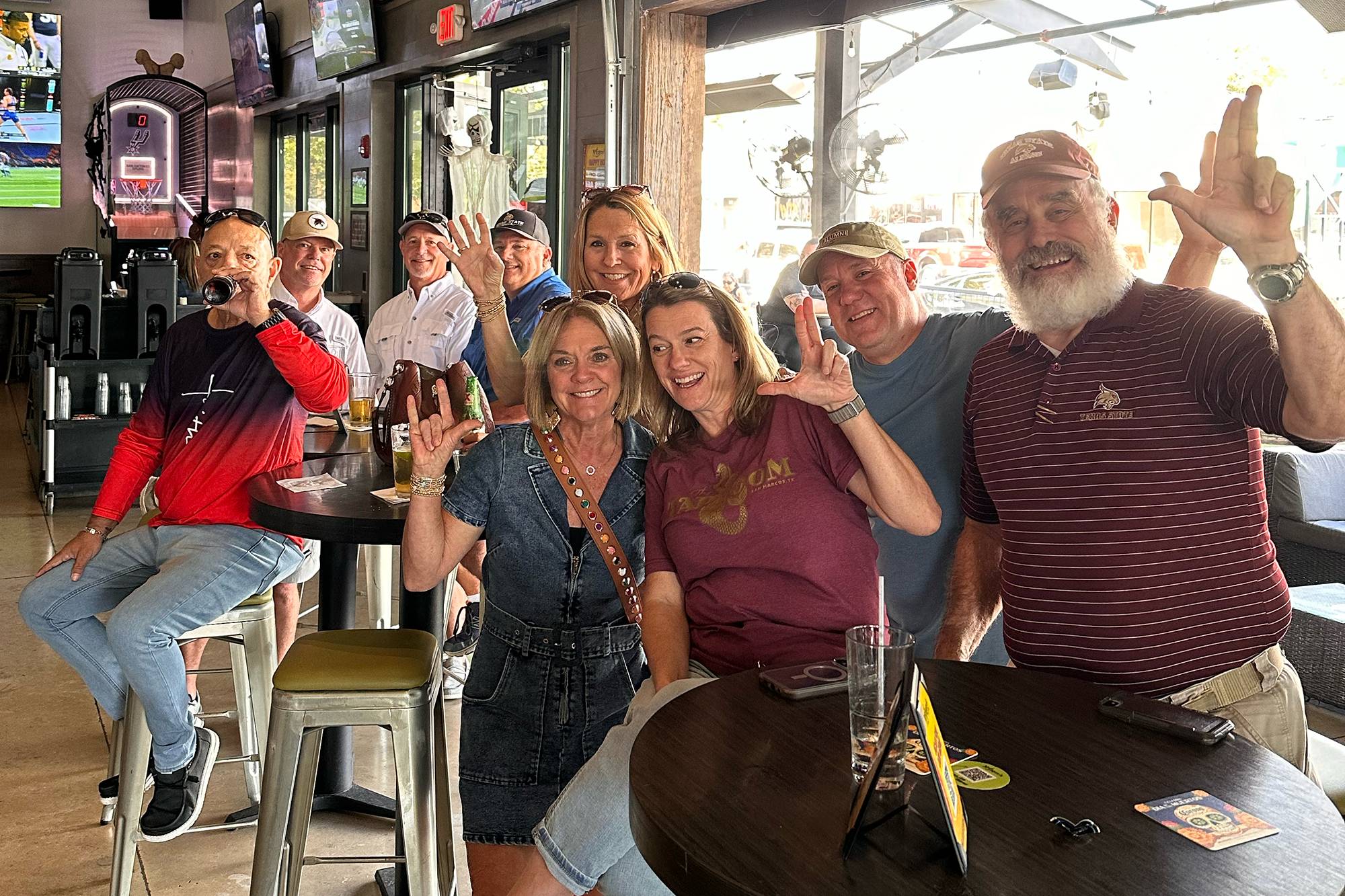 Group of Texas State fans at a watch party