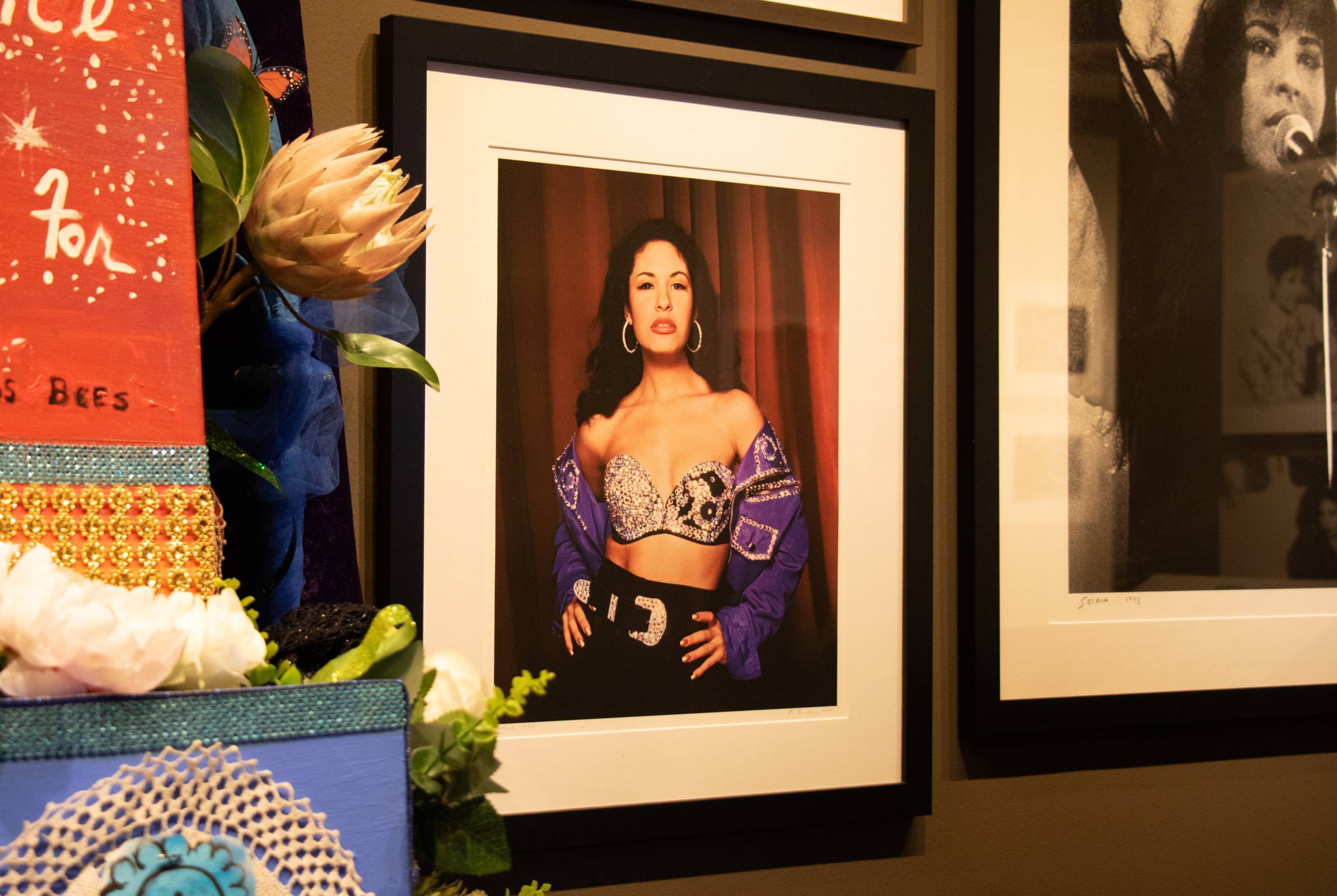 Photo of Selena surrounded by flowers