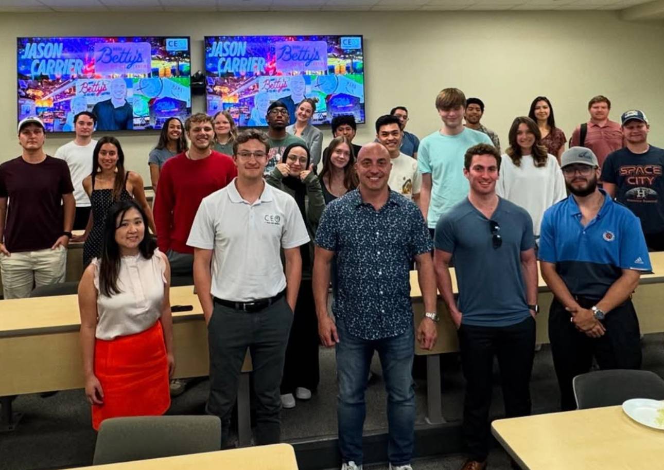 Entrepreneurship Club takes a group photo after a meeting.